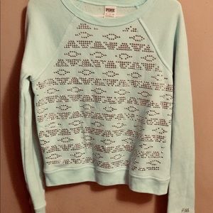Light teal sweatshirt. With bling.